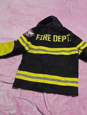 Disguise label with multicolor logo on black fabric